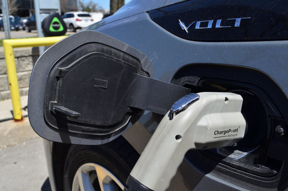Electric car connected to a charging station